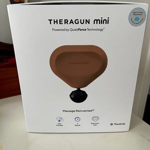 Theragun Mini in Rose. NIB